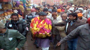 BJP candidate Sham Choudhary interacting with people during campaign on Thursday.