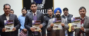 DDC, Dr Shahid Iqbal launching tourism magazine on Monday.