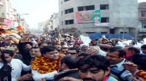 Cong candidate Vikram Malhotra leading rally of supporters on Wednesday.