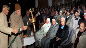 Ashok Kaul, general secretary BJP & Dr K N Pandita lighting the lamp during Chetna Divas at Jammu on Saturday. -Excelsior/Rakesh