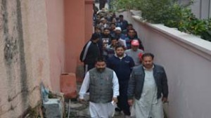 NC candidate for Jammu West, Dharamveer Singh Jamwal, during door-to-door campaign.