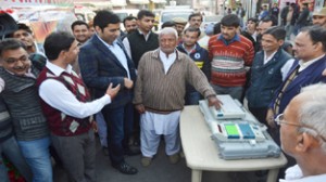 Deputy Commissioner, Dr Shahid Iqbal Choudhary interacting with people at 'Matdaan Mahotsav' on Sunday.