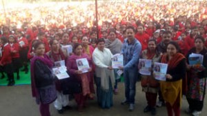 Students and others with Sankalp Patras during voter awareness programme at Jammu on Wednesday.