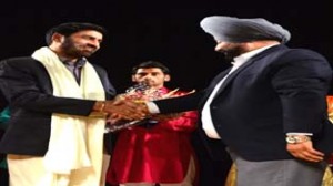 Natrang Director, Balwant Thakur, being felicitated by a dignitary at Theatre Festival 2014 in Patiala.