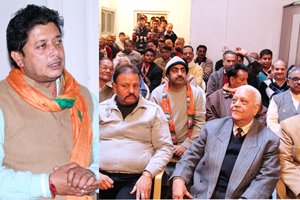 BJP candidate Rajesh Gupta addressing a meeting in Jammu East Constituency on Wednesday.