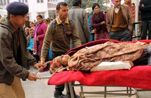 An injured woman being taken to the GMC Jammu on Saturday. — Excelsior/Rakesh