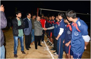Prof S K Jain, VC, SMVDU flanked by Director Sports and others interacting with players before the final match of Volleyball championship at Reasi.