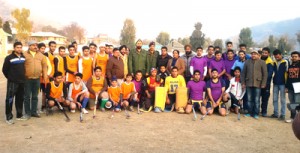 Winning team of District Hockey Championship posing for a group photograph with chief guest, SSP J S Johar and other dignitaries at Poonch on Thursday.