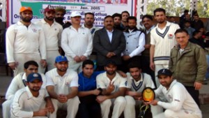 Jubilant JKP Kashmir Zone team posing for a group photograph after registering thrilling win in Police Martyrs Memorial T20 Tournament.