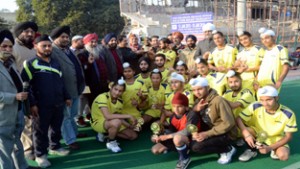 Winners posing along with the dignitaries during the concluding function of 2nd Shaheed Bhagat Singh Sub Jr Hockey Tournament in Jammu on Monday.