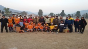 Participating teams in District Poonch Hockey Championship posing for group photograph at Sports Stadium, Poonch on Friday. 