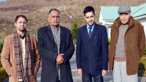 Student Waqar Mehmood Khan posing along with the dignitaries after excelling in North India’s Inter-University Festival.
