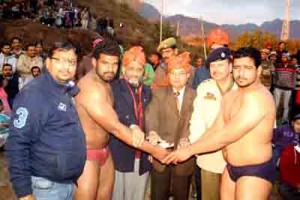 VC, SMVDU, Prof Sudhir Kumar Jain interacting with players before the start of bout for 115th Panthal Kesari Dangal title at Panthal in district Reasi on Wednesday.