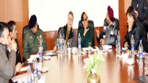 Divisional Commissioner, Rohit Kunsal chairing meeting at Leh on Wednesday.