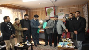 Officiating VC of CUK and Director Tourism shaking hands after signing MoU on Friday.
