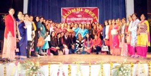 Alumnae of GCW Gandhi Nagar posing for a group photograph with college principal and other staff members during alumni meet at Jammu.
