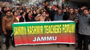 Members of Teachers Forum holding protest demonstration at Jammu on Thursday.-Excelsior/Rakesh