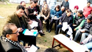 BJP MLA from Billawar, Dr Nirmal Singh during a meeting with PHE officials on Tuesday.