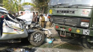 Badly damaged Tata Mobile which was hit by Army Truck near Bhambla on Sunday.