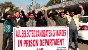 Selected candidates of warder in Prison Department raising slogans during protest at Jammu on Friday. -Excelsior/ Rakesh