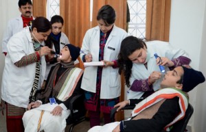 Doctors examining students during a dental check-up camp at SMVD Gurukul, Charan Paduka in Katra on Friday.