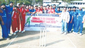 Participating teams posing for a group photograph along with the dignitaries during inaugural function of J&K Premier League T20 Cricket Tournament at GGM Science College Hostel ground in Jammu.