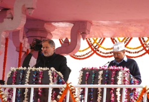Aam Aadmi Party (AAP) leader Arvind Kejriwal being sworn in as Delhi Chief Minister by Lt. Governor Najeeb Jung at the Ram Lila grounds in New Delhi on Saturday. (UNI)