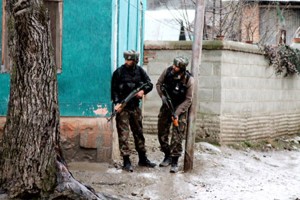 Troops take positions during encounter at Shermal, Shopain on Tuesday.