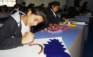 Students appearing in poster making competition on Monday.