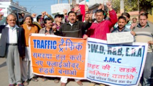 Jammu West Assembly Movement activists raising slogans in support of demands in Jammu on Wednesday.