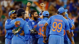 Members of the Indian team celebrate after they ran out South Africa's captain AB de Villiers for 30 runs during Cricket World Cup match at the Melbourne Cricket Ground on Sunday. (UNI)