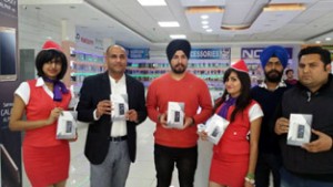 Proprietor, ABC Mobiles and others on launching of Lava Iris X8 at Gandhi Nagar in Jammu. 