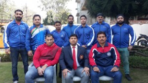 State power Lifters posing along with officials.