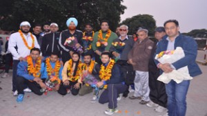  Medal winners in 35th National Games posing along with dignitaries on their arrival at Railway Station, Jammu on Wednesday. 
