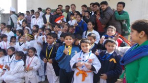 Winners of 5th District Ju-Jitsu Championship posing for a group photograph alongwith the chief guest, Kavinder Gupta.