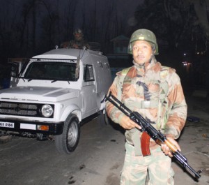 Troops at the site of encounter at Tral in Pulwama district on Friday.— Excelsior/Younis Khaliq