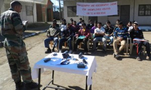  Army instructor giving tips during six day photography, videography cadre for youth on Saturday.