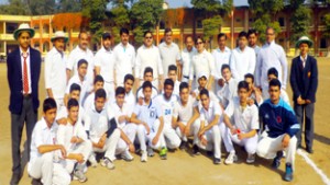 Teams of students and teachers of MHAC School Nagbani posing for a group photograph after the exhibition match.