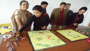 Dignitaries watching kids busy in painting during ‘Display Your Talent’ at Sai Shyam College of Education on Wednesday.