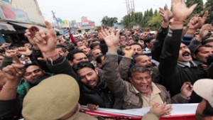 Casual and need based workers of various departments during a protest near Dogra Chowk, Jammu. —Excelsior/Rakesh