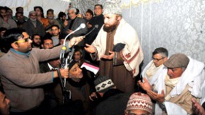 National Conference working president and former Chief Minister Omar Abdullah along with his uncle Dr Mustafa Kamaal during a fateh ceremony of National Conference patron Sheikh Nazir Ahmad in Srinagar on Friday.        -Excelsior/Amin War