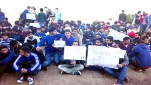 Students of  COET of  BGSBU staging protest dharna outside their college at Rajouri on Friday.  -Excelsior/Bhat