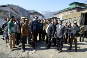 District officials inspecting main market Baramulla on Saturday. -Excelsior/Aabid Nabi