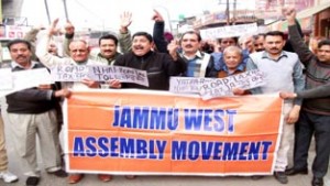 JWAM activists holding protest at Jammu on Wednesday.