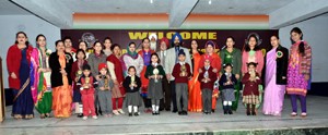 Winners of poem recitation and drawing competition posing along with dignitaries during valedictory function.