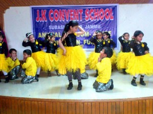Children performing colourful cultural item while celebrating annual day at JK Convent School on Saturday.