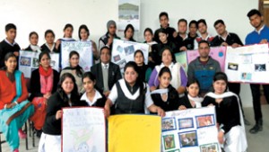 Winners of Poster making, Slogan writing and Collage making competition posing for a group photograph.