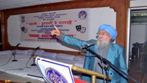 Poet reciting poem during Poetic Symposium in Punjabi.