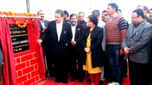 Commissioner Secretary Agriculture Production Department Asgar Hassan Samoon laying foundation stone of food processing and distrubution centre at Industrial Complex on Wednesday.