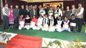 Winners of symposium posing along with the dignitaries at GDC Kathua on Monday.